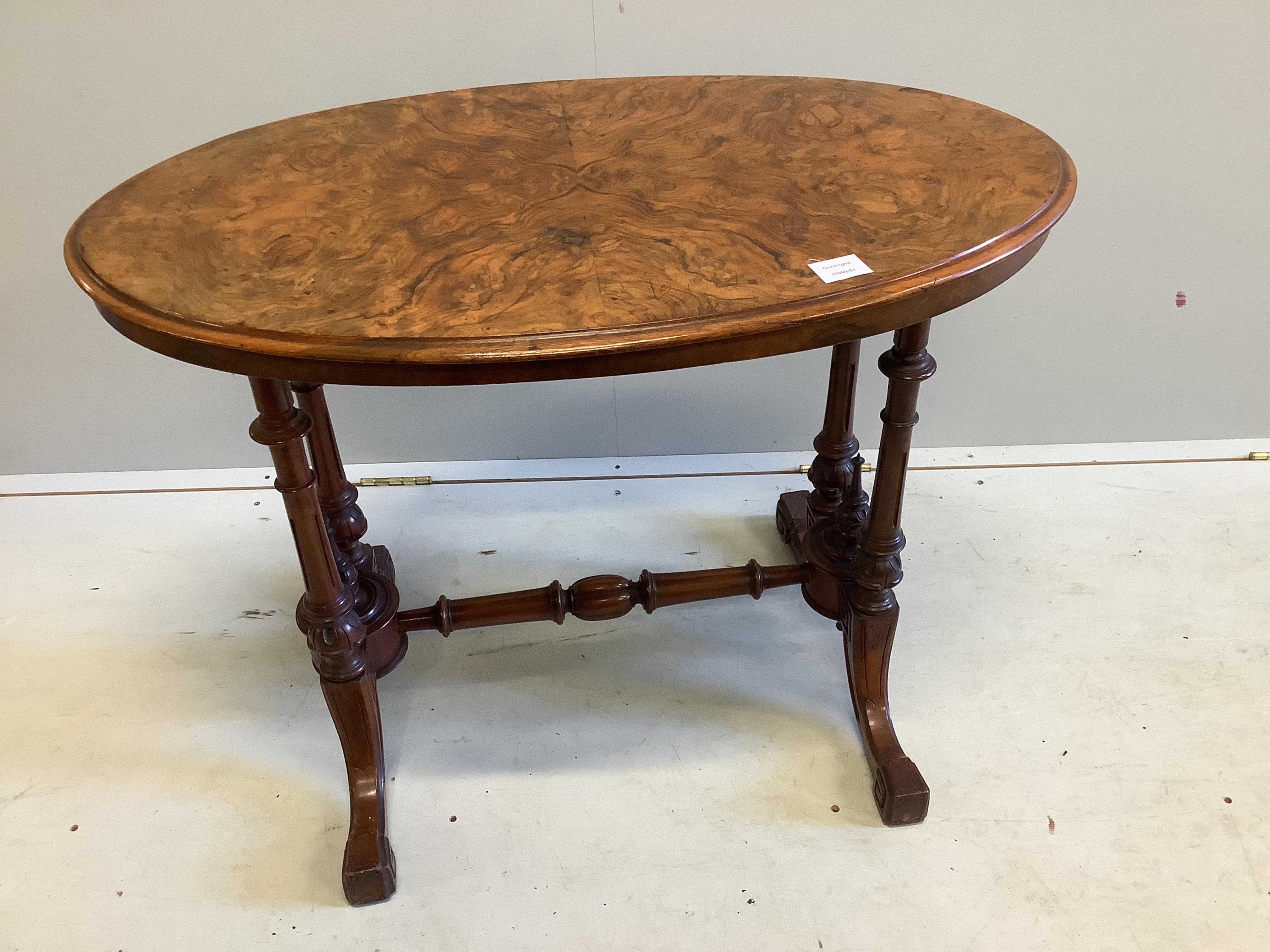 A Victorian figured walnut oval topped centre table, width 88cm, depth 53cm, height 69cm. Condition - fair